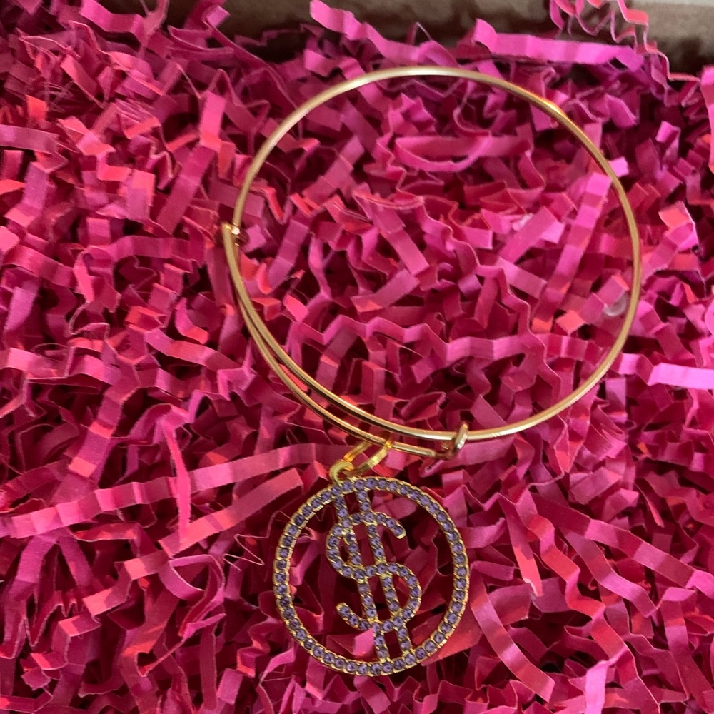 Gold bracelet with purple bling